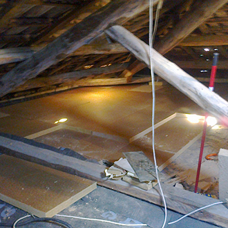 Attic wood fiber insulation