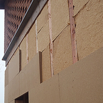 Wood fiber thermal insulating system on X-Lam